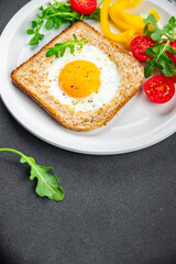 fried egg bread toast scrambled yolk protein delicious breakfast hearty food fresh delicious healthy eating cooking appetizer meal food snack on the table