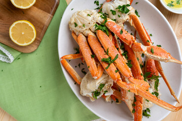 Steamed Crab Legs with Garlic Butter and Parsley Flakes © TodN