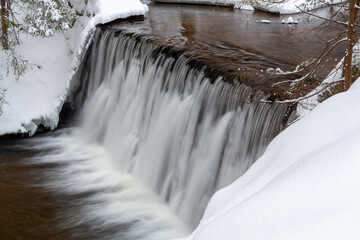 Kropelka waterfall in winter, Lower Silesia, Poland.