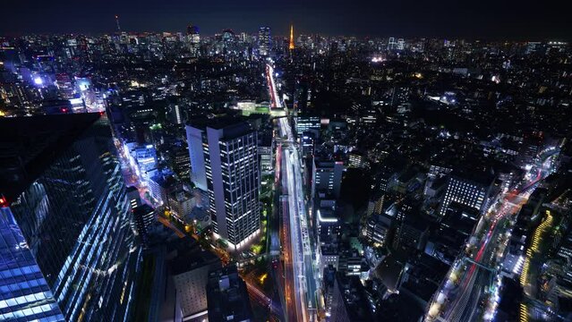 Tokyo Timelapse - Night view of Tokyo Tower and Roppongi Minato Ward direction cityscape seen from Shibuya