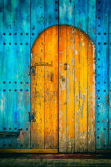 Residential old blue house yellow  Wooden door