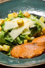Caesar salad with salmon