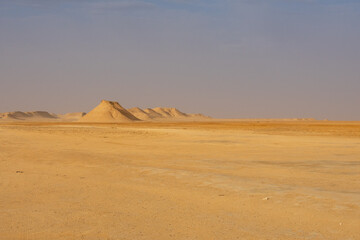 Beautiful landscape in Middle of Sahara Desert in Tunisia, North Africa. Sand dunes and rock formations