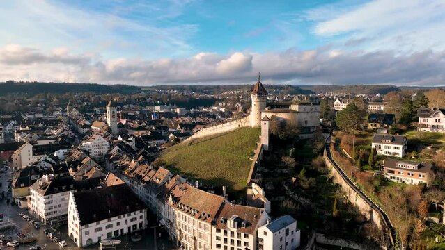 Aerial drone footage of the Schaffhausen old town by the Rhine river in eastern Switzerland