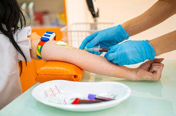 Person Getting Tattoo on Another Persons Arm, A Step-by-Step Look at the Tattooing Process