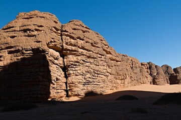 Tikoubaouine rock formations in the tourist area of Immourouden, near the town of Djanet. Tassili n Ajjer National Park. Sahara desert. Algeria. Africa.