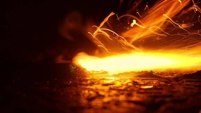 Fuse Burning Across The Ground Closeup
