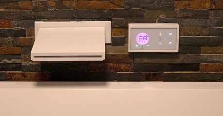 Modern digital watertap, filling the white bath