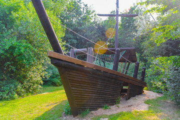 Wooden ship on a playground in the park in Germany.