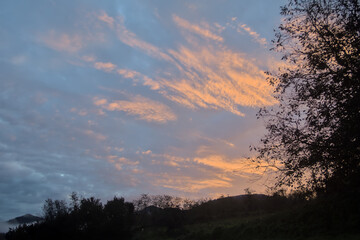 colorful sky on a winter sunset in the basque country of spain