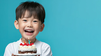 Asian boy holds cake. Prepares for party or birthday celebration expresses good emotions. Birthday party for kids.