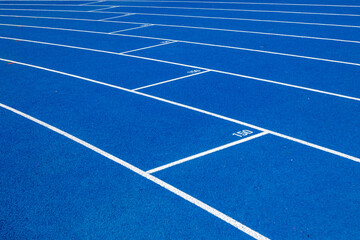 Blue treadmill for running in the stadium - 715072140