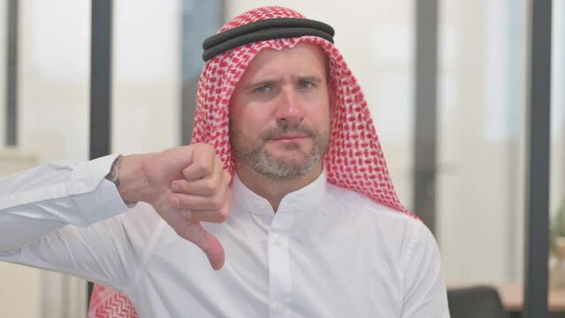 Portrait of Arab Man with Thumbs Down