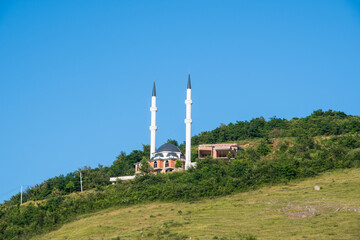 Fototapeta na wymiar Mosque in the hills of city of Prizren in Kosovo