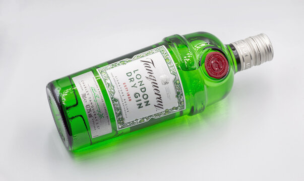 Tanqueray London dry gin bottle closeup against white.