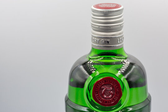 Tanqueray London dry gin bottle closeup against white.