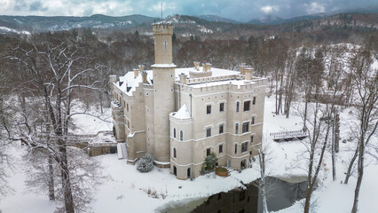 Karpniki Castle in winter scenery, Poland. - 715088399