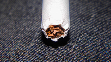 Cigarrete tobacco tip in a texture