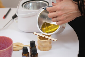 making a massage scented candle witches witchcraft using wax and coconut oil mango cocoa butter master class pour. Aroma drops weigh melt wax in firebox making craft scented candles