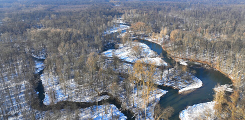 River winter floodplain delta snow meander drone aerial inland video shot in sandy sand alluvium...