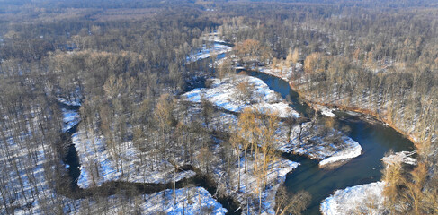 River winter floodplain delta snow meander drone aerial inland video shot in sandy sand alluvium...