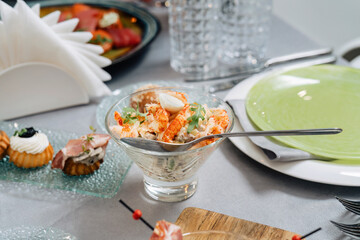 Shrimp salad with quail egg, set the table beautifully.