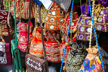 Puttaparthi, India. Bags on the street market in Puttaparthi.