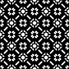A white background with black design.Seamless texture for fashion, textile design,  on wall paper, wrapping paper, fabrics and home decor. Simple repeat pattern. Geometric patterns.