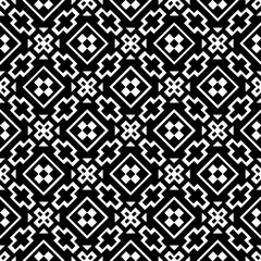 A white background with black design.Seamless texture for fashion, textile design,  on wall paper, wrapping paper, fabrics and home decor. Simple repeat pattern. Geometric patterns.