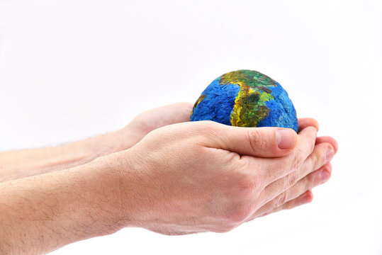 Hand hold the Earth planet close up view