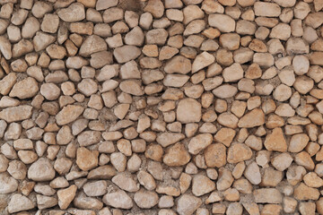 Wall of old beige stone. masonry. Stones wall background or texture. Texture laid out of stone. Old  wall background. Natural stone wall made of stones. Abstract grunge background