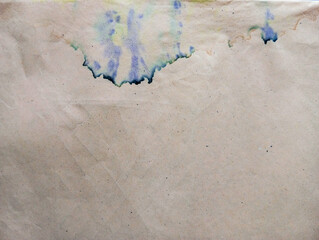 Abstract ink grunge background with copy space. Dirty paper with ink stains. 