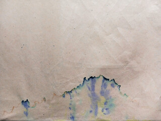 Abstract ink grunge background with copy space. Dirty paper with ink stains. 