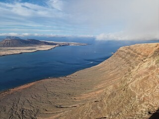 Mirador del Río, Lanzarote's iconic viewpoint, offers a breathtaking panorama of the Atlantic and neighboring islands.