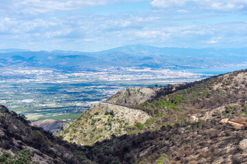 Fototapeta na wymiar Panoramic view on hiking trail to the peak Mijas, Malaga, Spain