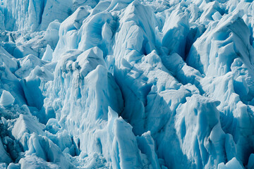 Glacier close-up. Abstract background of an icy seashore.