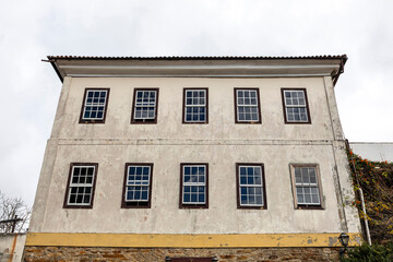  Urban landscape of colonial houses, streets and windows of the historic center.