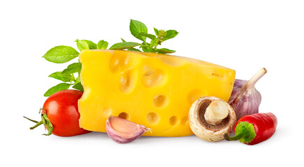 Yellow cheese with fresh vegetables and herbs. Red tomato vegetable, chili pepper, garlic mushrooms green basil oregano leaves. Organic natural food isolated on white background.