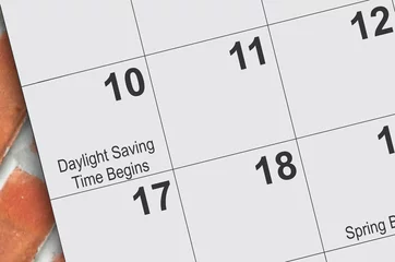 Foto op Plexiglas Daylight saving time on a calendar page © LEe