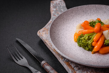 Delicious fresh vegetables broccoli, cauliflower, carrots steamed with salt and spices