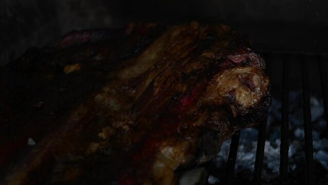 slow motion video of grilled Argentine roast beef