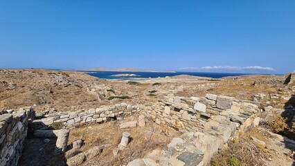 Fototapeta na wymiar Delos Island, a jewel in the Aegean Sea, holds rich mythological and archaeological significance. 