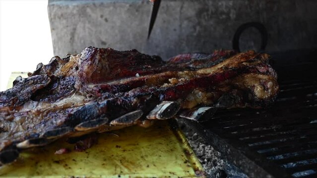 slow motion video of grilled Argentine roast beef 2