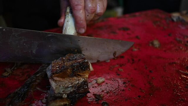 slow motion video of grilled Argentine roast beef 3