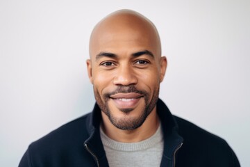 Portrait of handsome african american man smiling and looking at camera