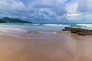 Beautiful sea beach background,Amazing sea ocean in good weather day,Beautiful waves crashing on sandy shore Nature beach sand background