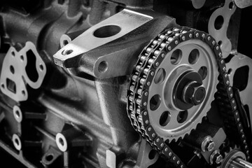 new car timing chain on a disassembled engine in a car workshop. Timing chain in internal combustion engine