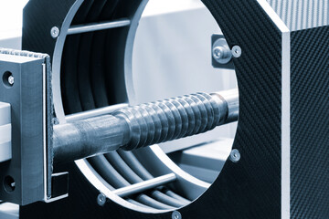 Metal stainless steel shaft with screw in an industrial processing machine
