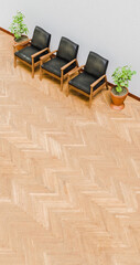 two pots and three wooden chairs with black cushions in room with white wall and brown floor