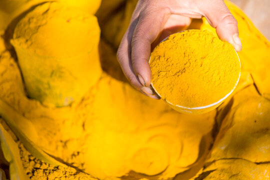 Turmeric powder (curcuma) for sale at local market, Myanmar